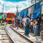 Damnoen Saduak Floating & Maeklong Train Market Day Tour - Detailed Analysis of the Experience