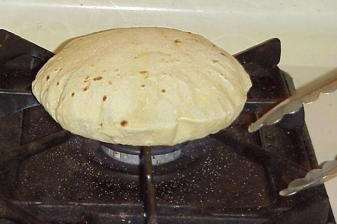 Half-Day Cooking Lesson and Dinner With Local Family in New Delhi - Discovering the Heart of North Indian Vegetarian Cuisine