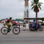 Kanchanaburi Sunset Ride with History and Homestyle Dinner - Visiting the Kanchanaburi War Cemetery