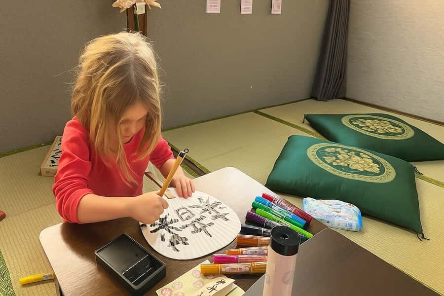 Kyoto : Calligraphy on a Washi hand Fan & Origami Fun - Exploring the Experience in Detail