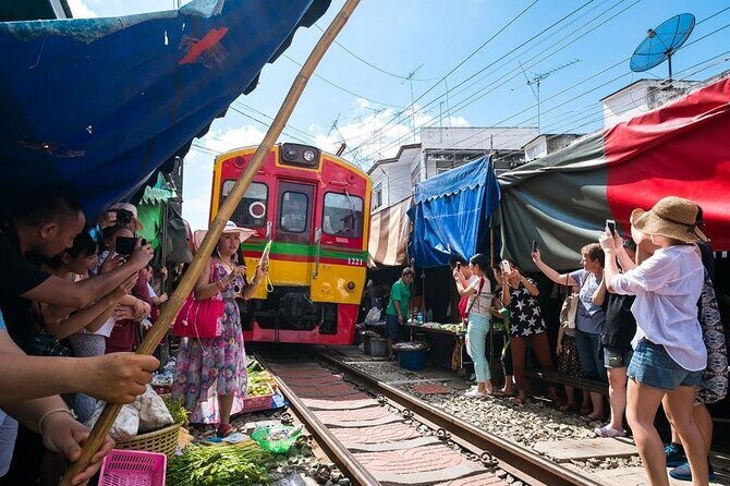 Maeklong Railway Market & Damnoen Saduak Market Paddle Boat Tour - Practical Details and Value