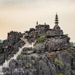 One day with Hoa Lu Capital, Mua Cave and Trang An Grottoes (Small Group tour) - Climbing Mua Cave for Panoramic Views