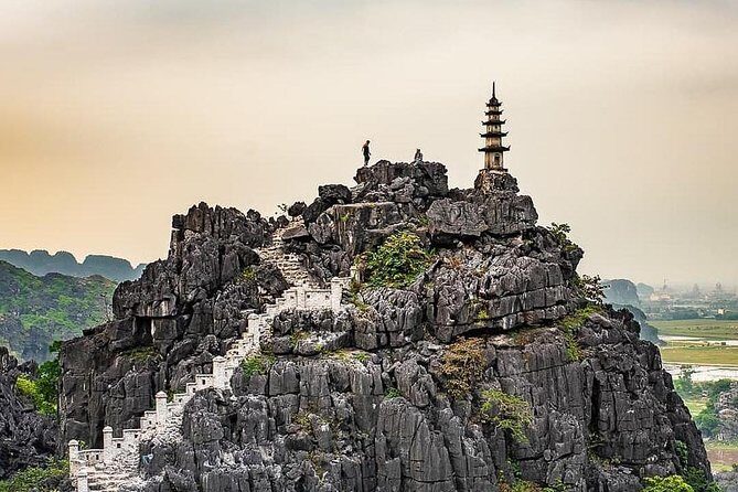 One day with Hoa Lu Capital, Mua Cave and Trang An Grottoes (Small Group tour) - Climbing Mua Cave for Panoramic Views