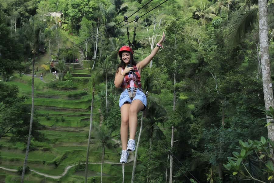 Ubud: Zipline, Waterfall & Tirta Empul Holy Temple Day Tour - Detailed Breakdown of the Itinerary