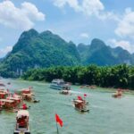 Yangdi Bamboo Rafting, Ancient Stone City& Show Tour - Exploring the Ancient Stone City