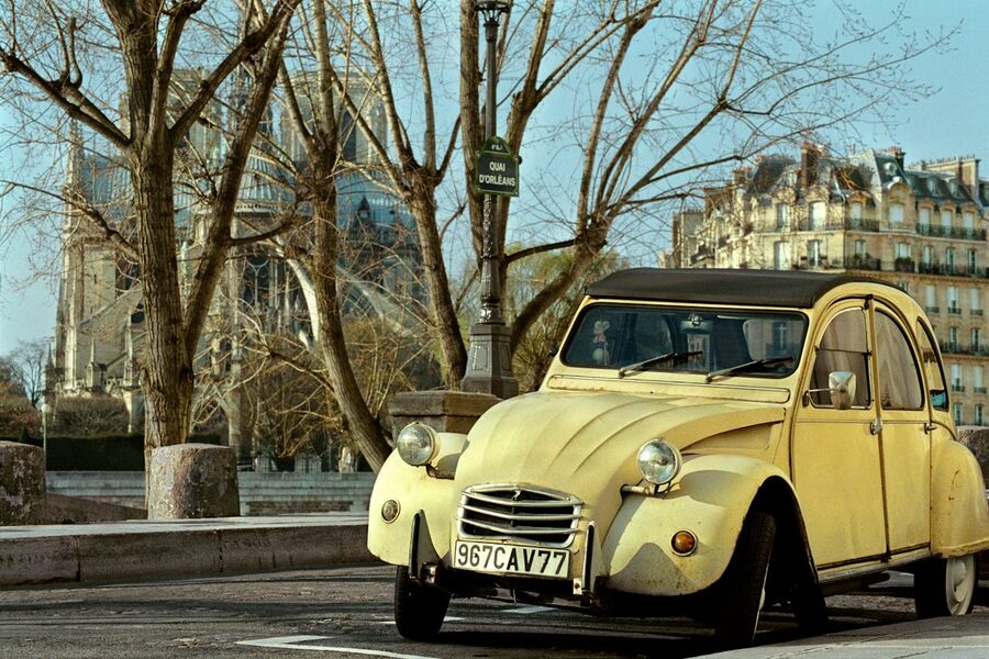 Citroen 2CV parked near Notre-Dame Cathedral in Paris