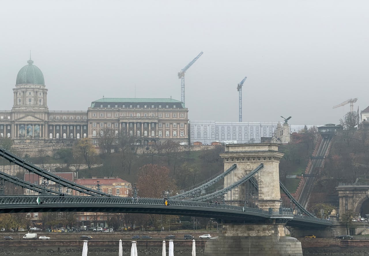 The Chain Bridge crossing the Danube River with Budapest buildings in the background