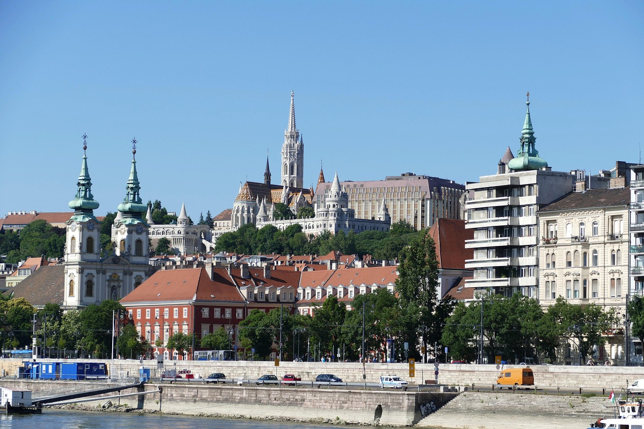 A Budapest bridge spanning the Danube River on a sunny clear day