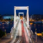 Budapest buildings and bridges lit up along the Danube River at night
