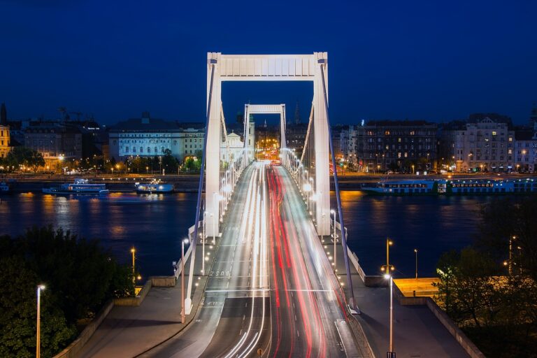 Budapest buildings and bridges lit up along the Danube River at night