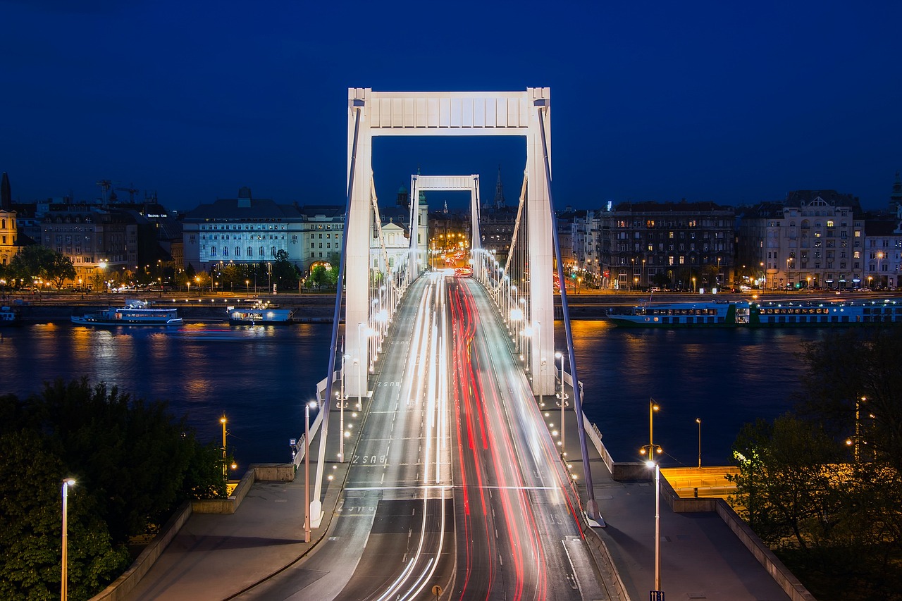 Budapest buildings and bridges lit up along the Danube River at night