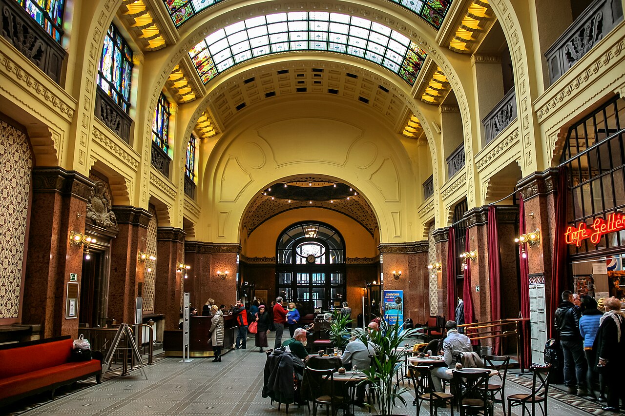 The grand facade of Gellért Thermal Bath showing art nouveau architecture