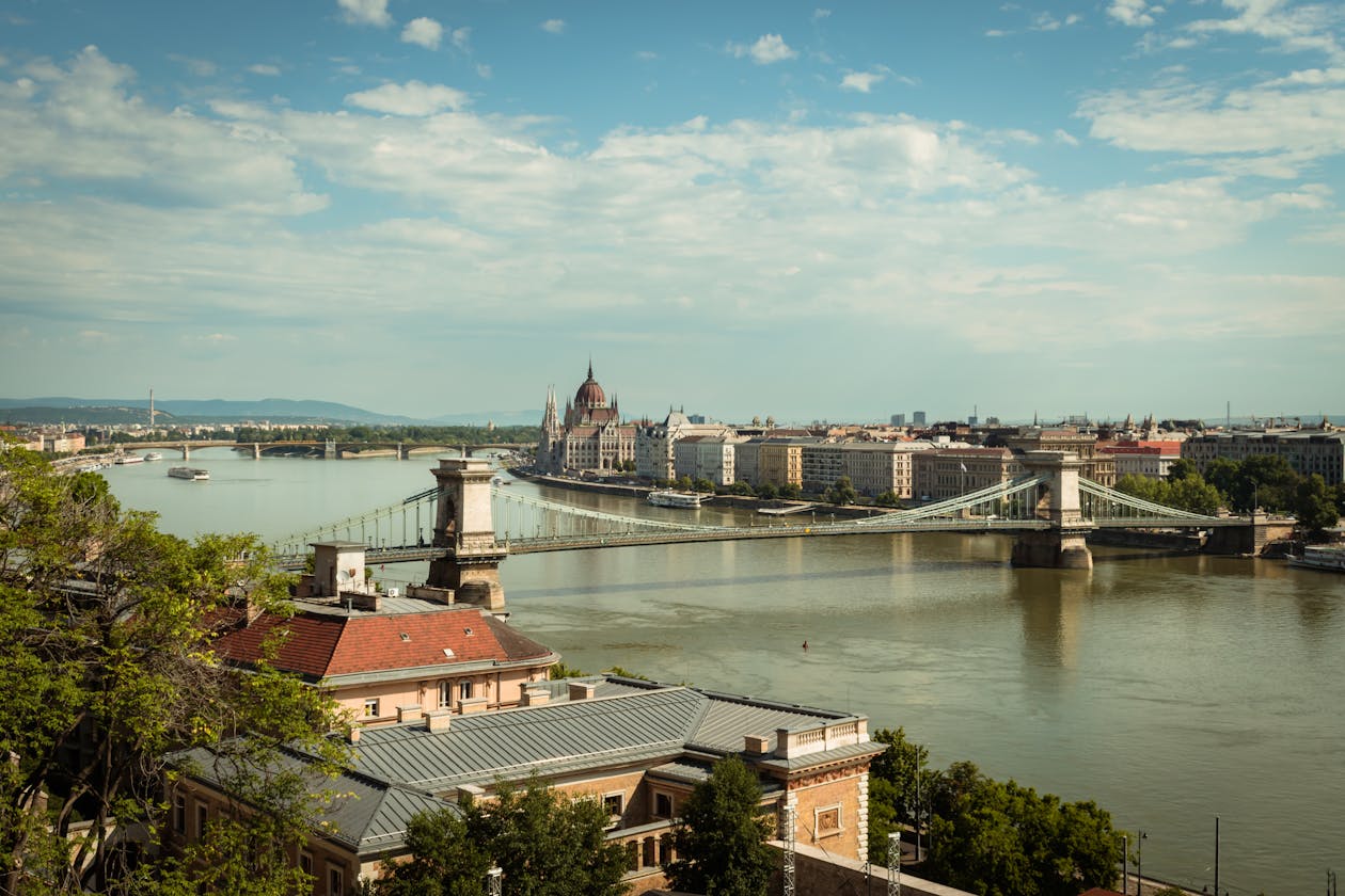 Summer view of Chain Bridge and Hungarian Parliament along the Danube River in Budapest