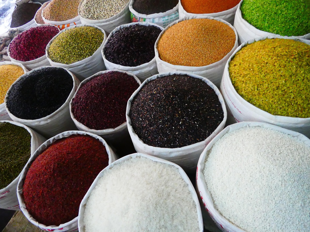 Colorful spice market stall displaying various spices and paprika