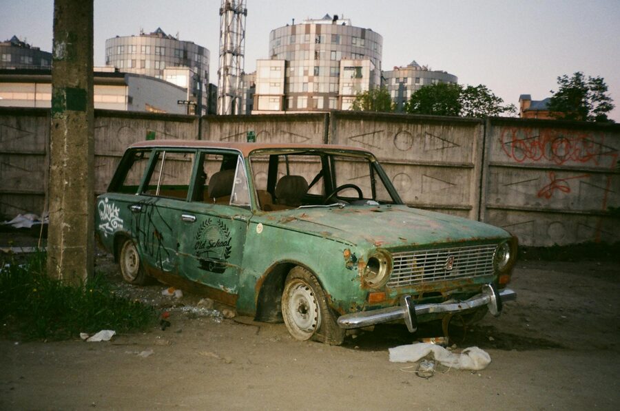 Abandoned vintage car with rust