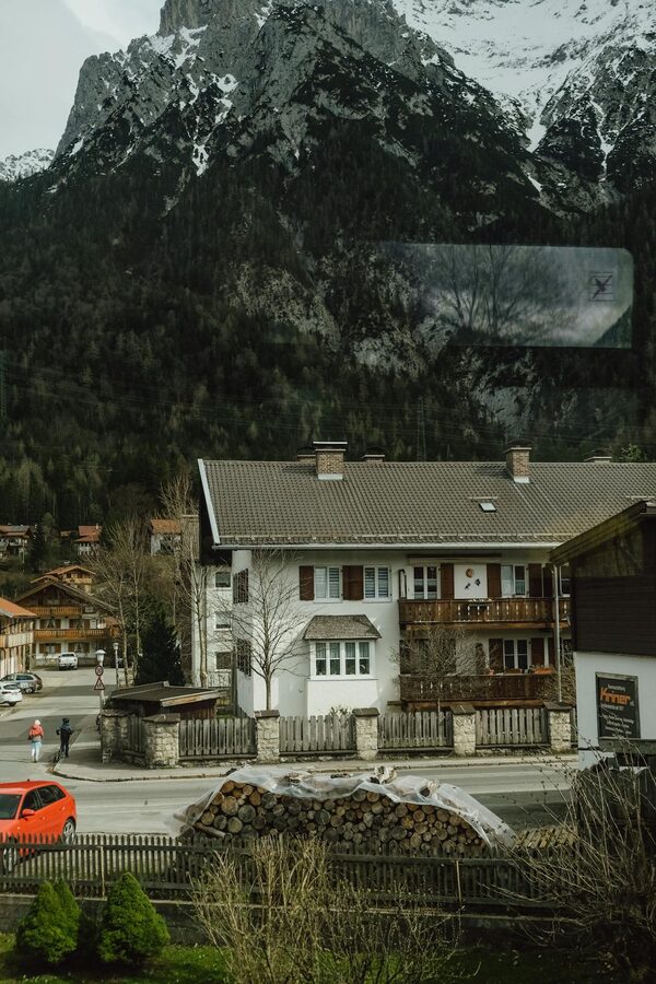 Alpine village with traditional houses and mountain scenery