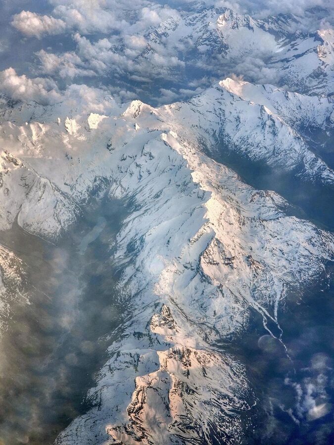 Panoramic view of snow-capped Alpine mountains