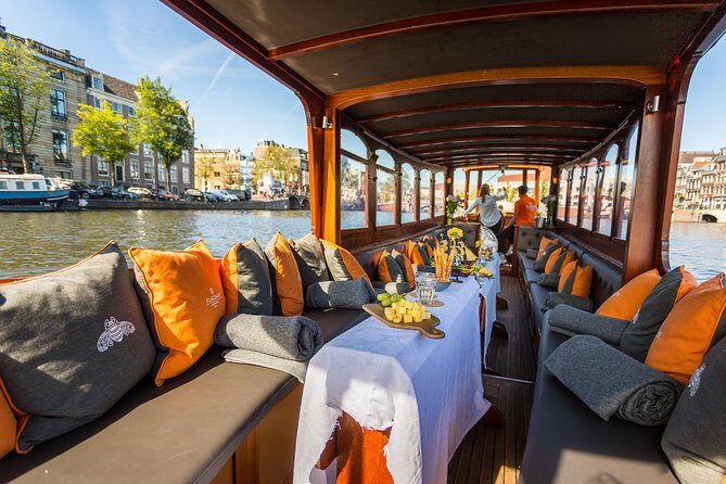 Amsterdam Classic Saloon Boat Cruise with Drinks and Cheese - Guide Commentary: Where the Cruise Gets Its Real Value