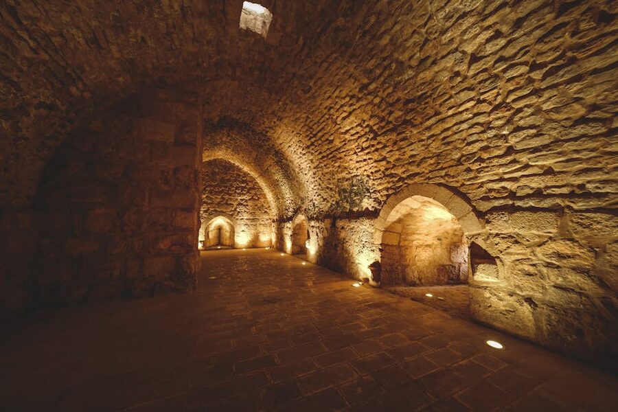 Ancient stone tunnel with soft lighting