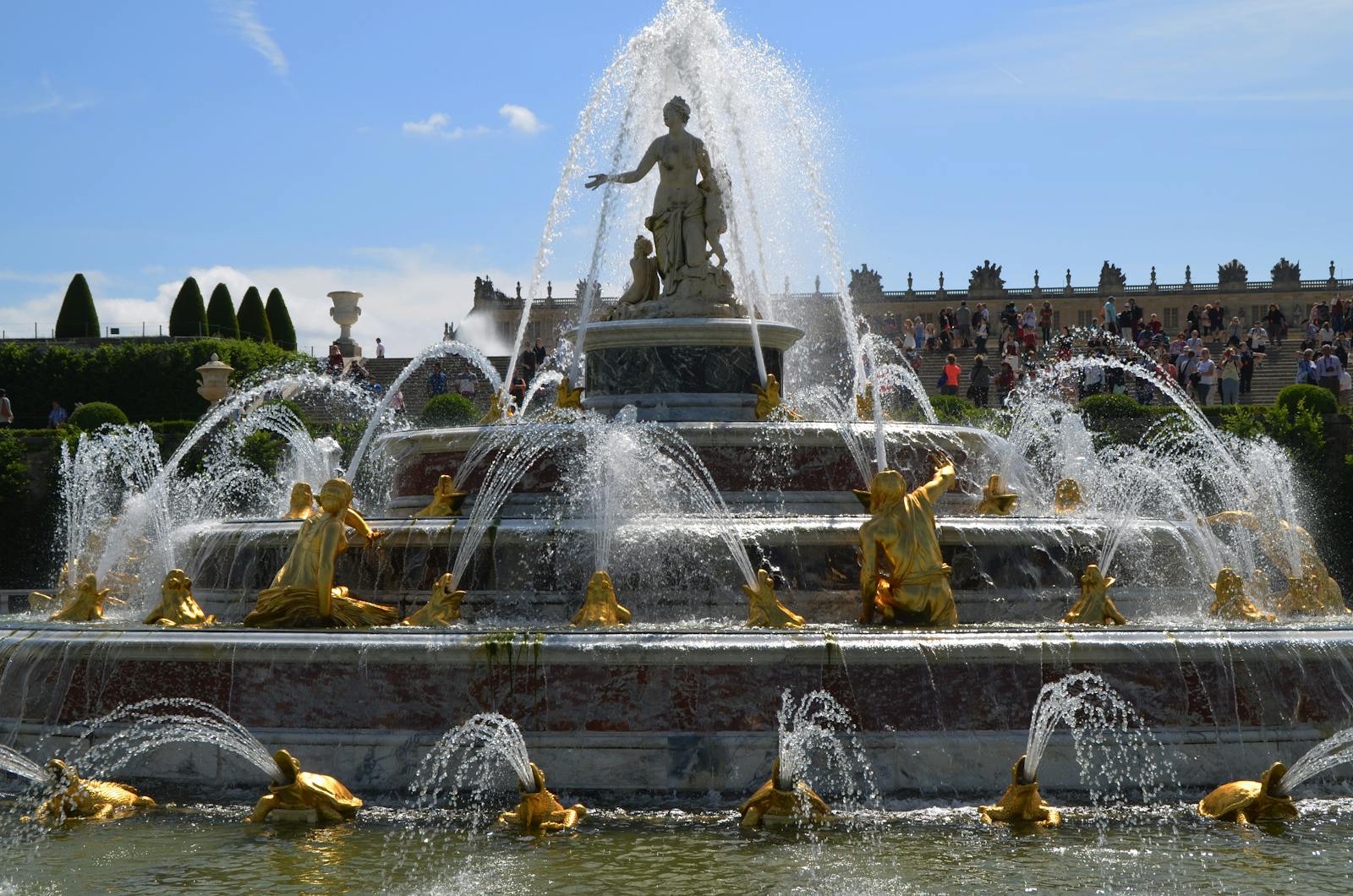 Golden statues at the Fountain of Apollo at Versailles