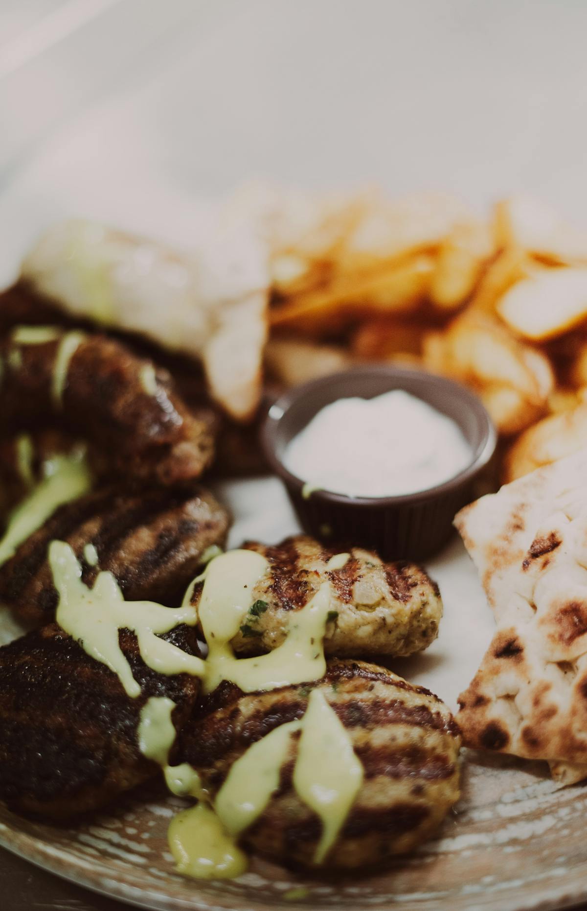 Traditional Greek souvlaki with pita and tzatziki dip