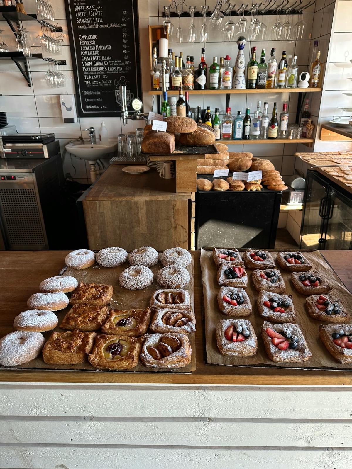 Variety of pastries displayed in a cosy bakery