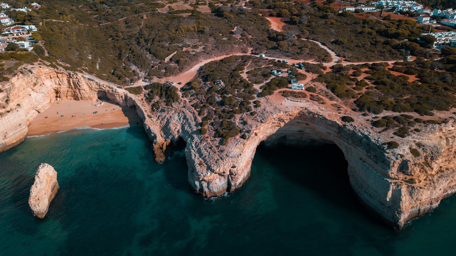 Aerial view of the Benagil Cave dome opening from the clifftop