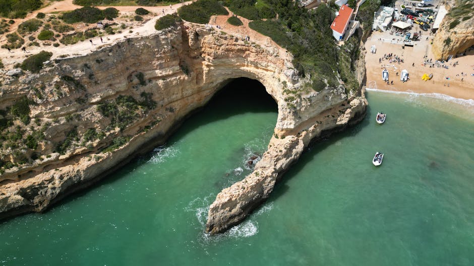 Golden limestone cliffs along the coast near Benagil