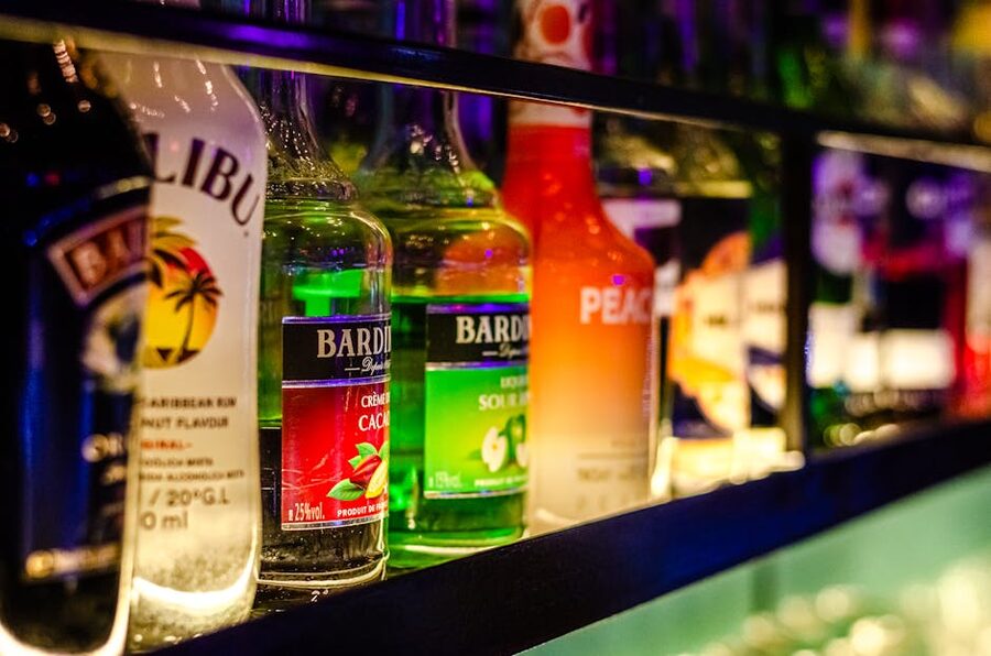 Liquor bottles displayed on bar shelf Berlin
