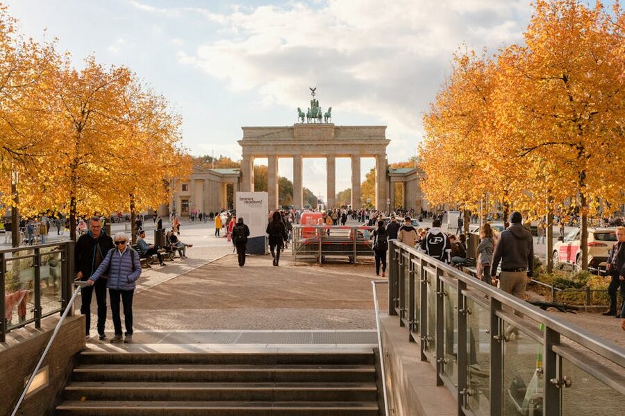 Crowds Brandenburg Gate sunny autumn