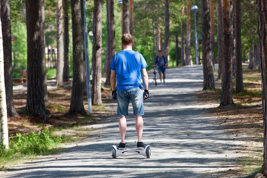 Segway riding on promenade in nature