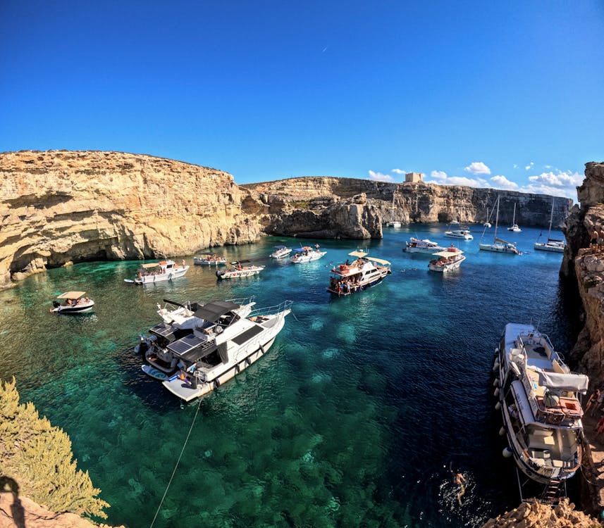 Aerial view of Blue Lagoon in Malta with boats and clear waters