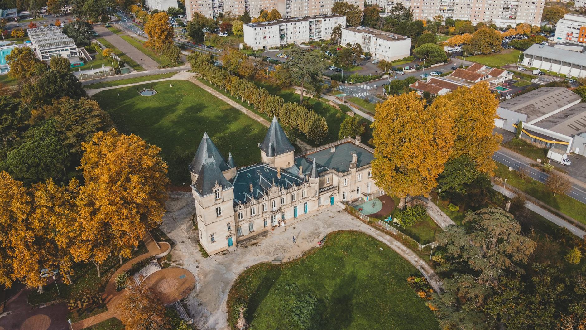 Bordeaux chateau surrounded by fall foliage