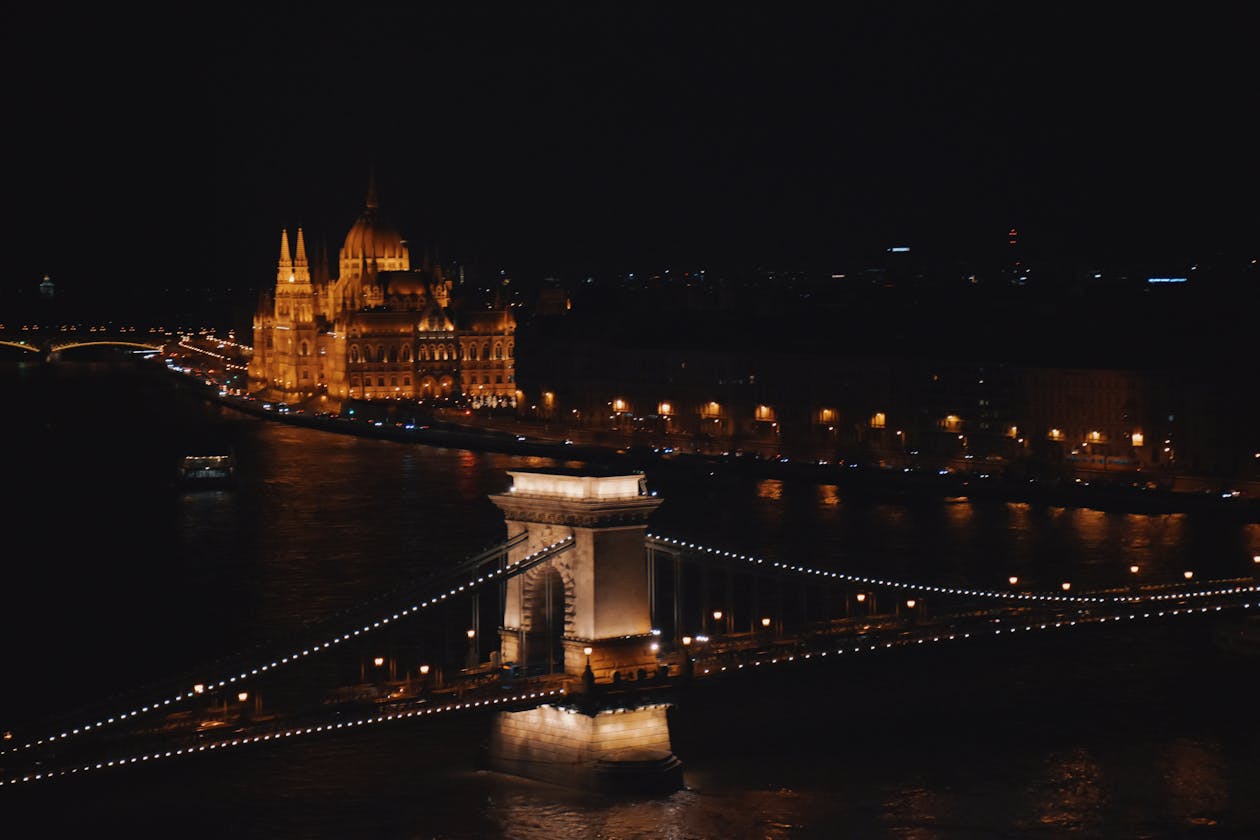 Chain Bridge and Parliament illuminated at night in Budapest