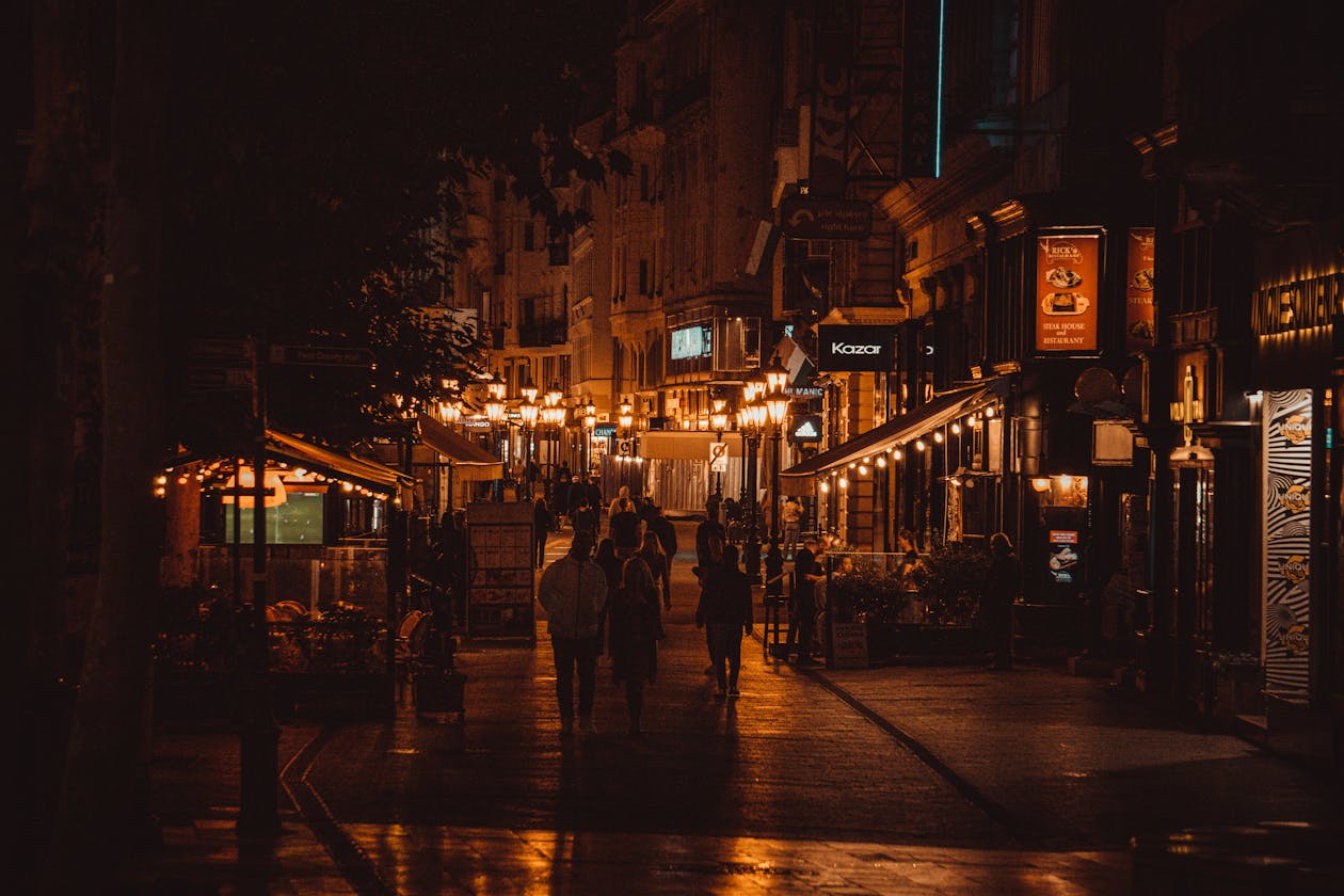 Illuminated alley in Budapest District VII at night