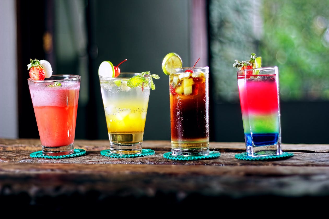 Colorful cocktails lined up at a Budapest bar