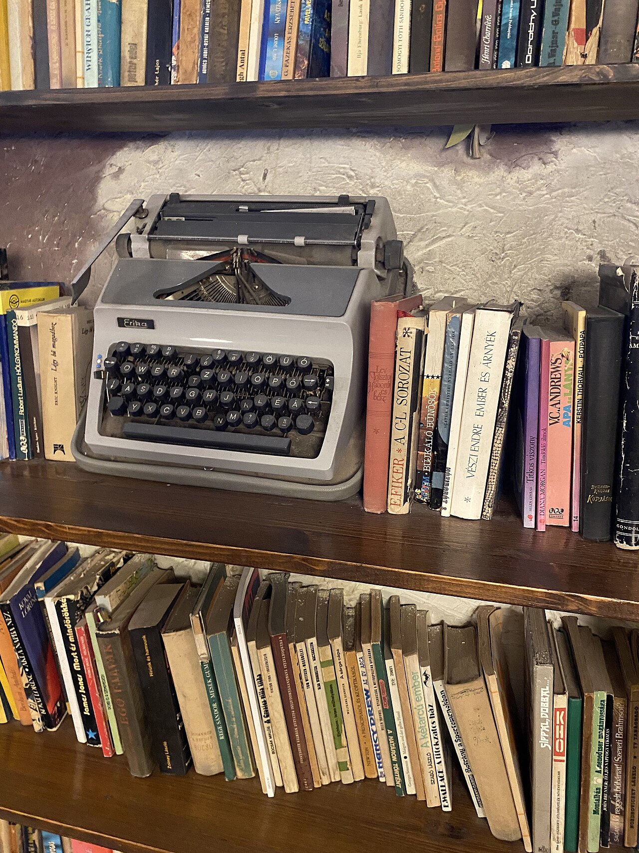 Vintage typewriter and books used as decor in a Budapest ruin bar