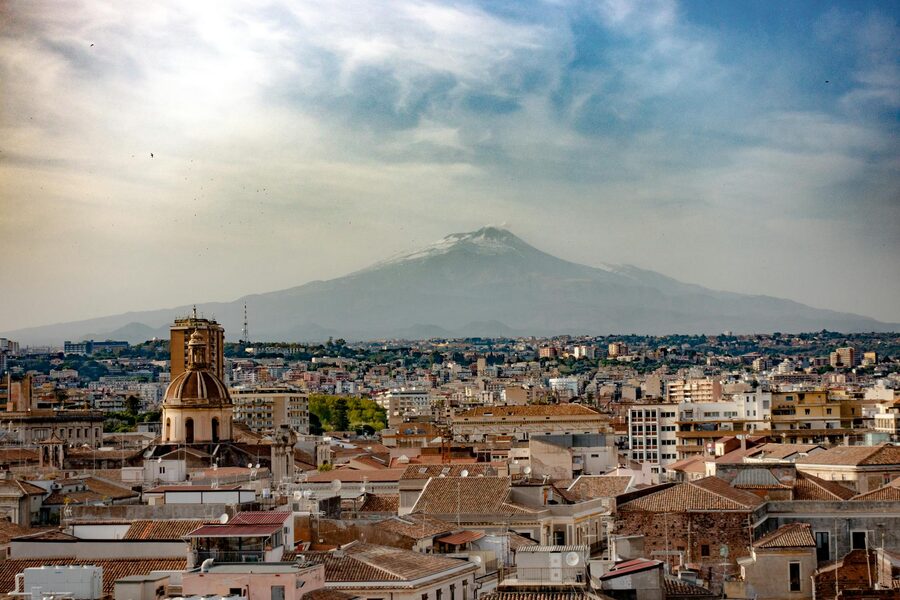 Catania Sicily cityscape with Mount Etna in background