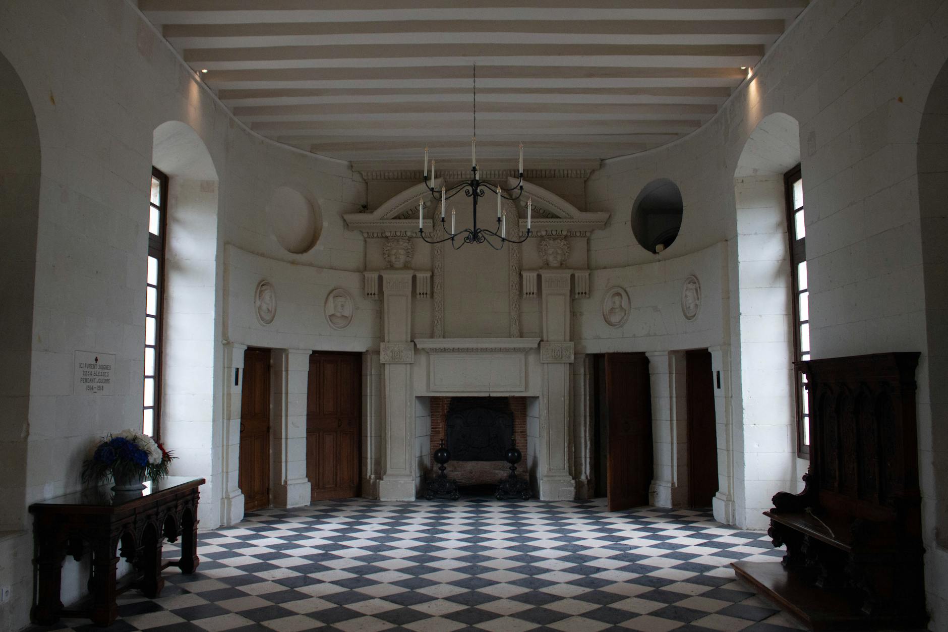 Elegant hall inside Château de Chenonceau with checkered floor