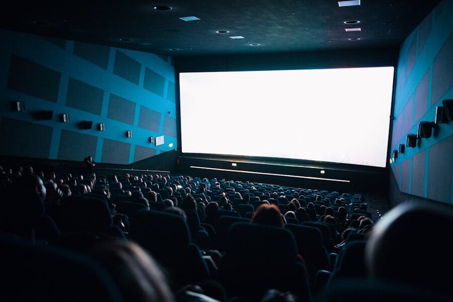 Cinema audience watching large screen