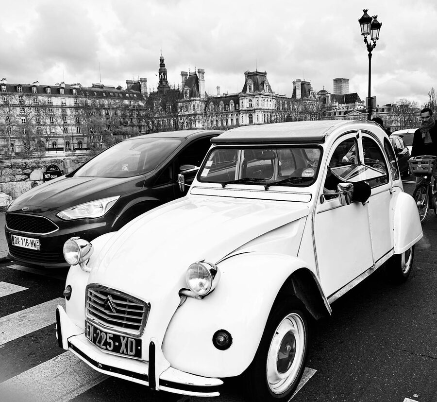 Classic Citroen 2CV on a Paris street in black and white