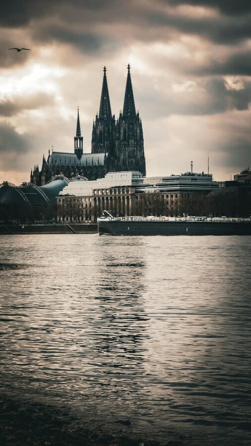Cologne Cathedral spires against the sky by the Rhine