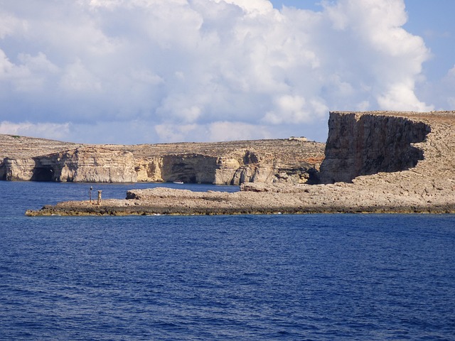 Comino island Malta dramatic cliffs and sea