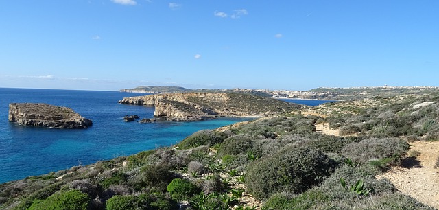 Comino Malta rocky coastline with turquoise sea