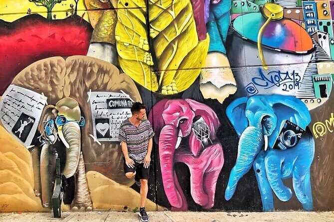 Comuna 13 Graffiti Tour with Street Food - Independence 1 Murals: Seeing the Meaning Behind the Paint
