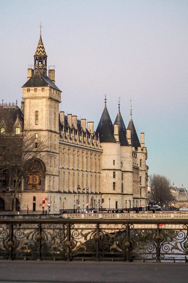 Conciergerie Gothic architecture at dusk in Paris