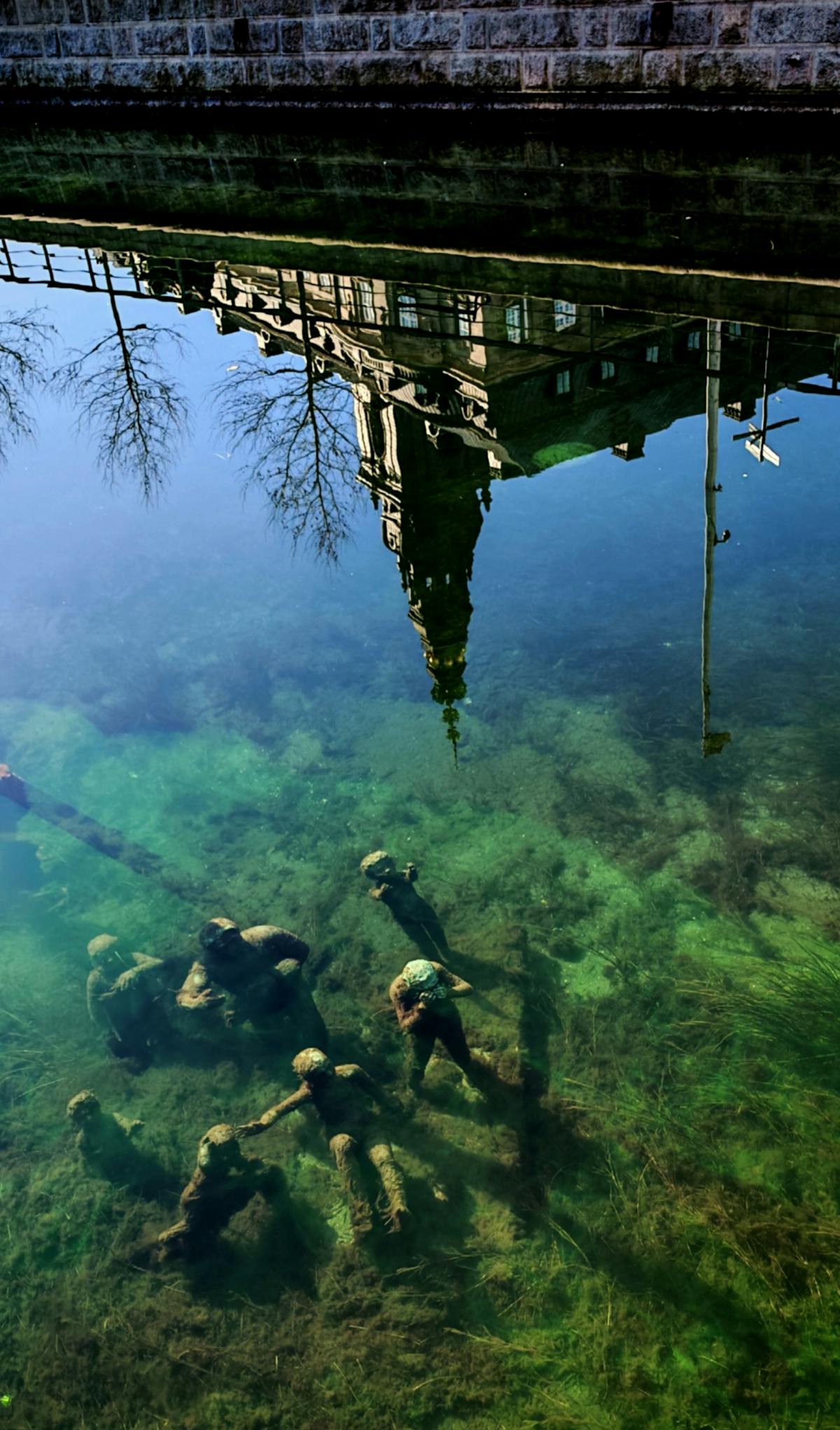 Copenhagen canal with architectural reflections and waterfront scene