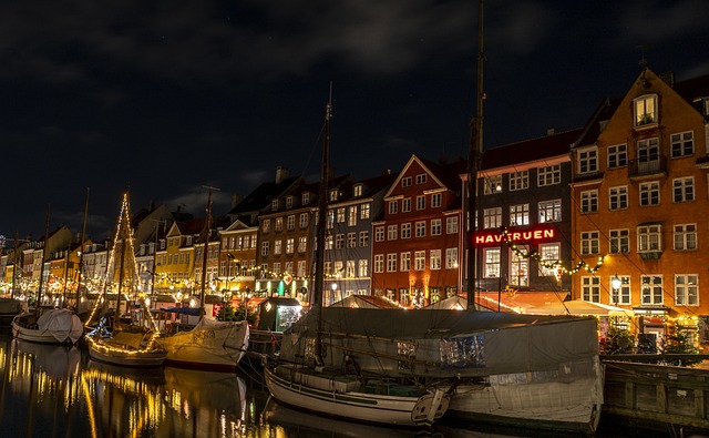Nyhavn colourful buildings reflected in the canal at night