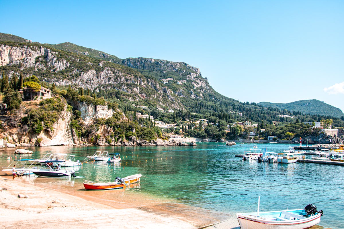 Azure coastline of Corfu with mountains in the background