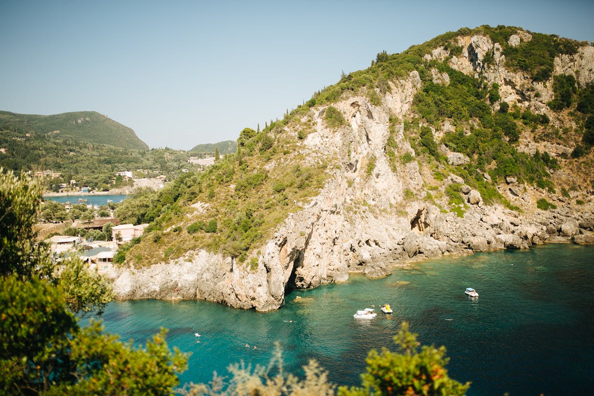 Coastal landscape with turquoise waters and rocky hillside